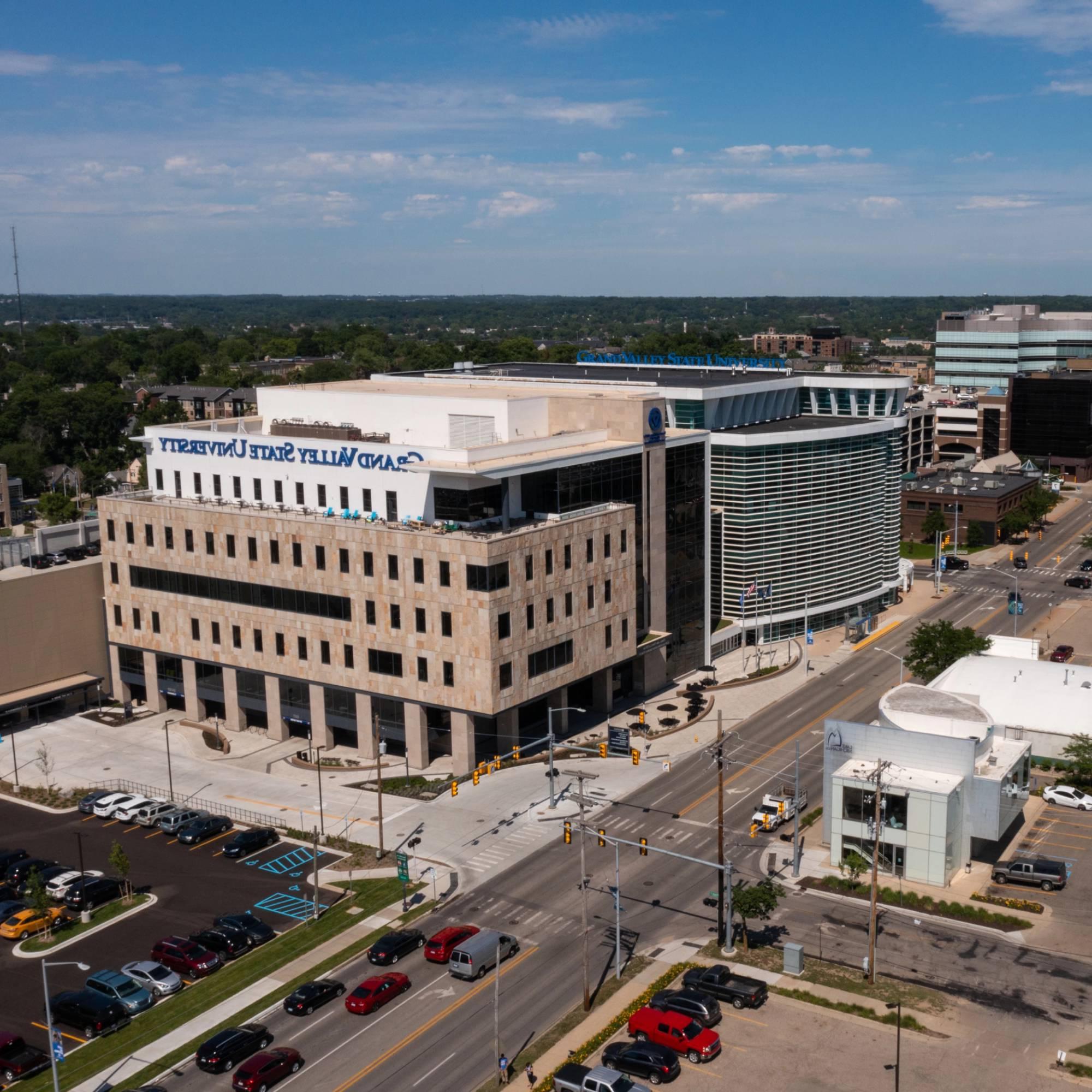 The downtown DeVos Center for Interprofessional Health building is displayed.